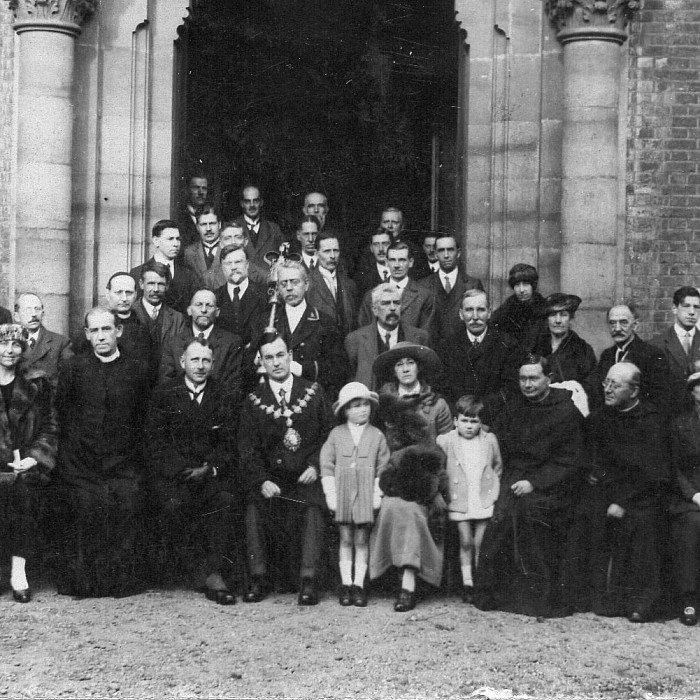 A parish group with clergy, photographed in the mid-twentieth century